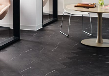 Resilient marble effect planks