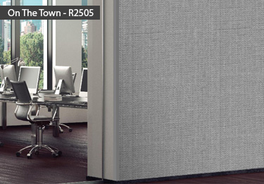 Wall covering roll features a subtle chevron pattern available in 97 colors
