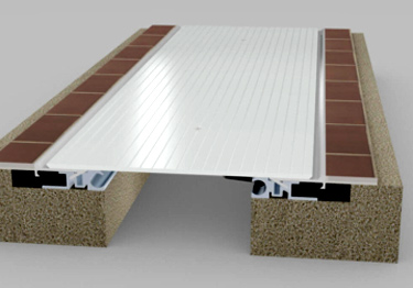 Seismic expansion joint covers with flush mount or surface mount assembly. 