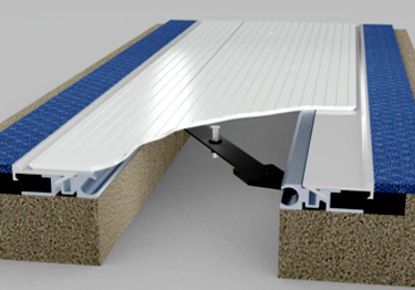 Seismic expansion joint covers with flush mount or surface mount assembly. 